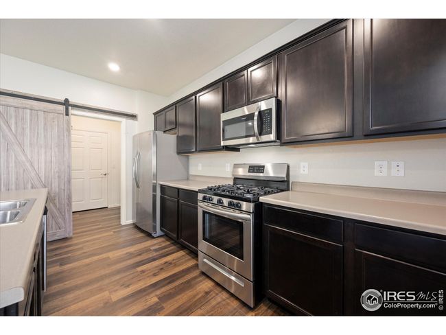 6793 Hayfield St, House other with 4 bedrooms, 3 bathrooms and null parking in Wellington CO | Image 7