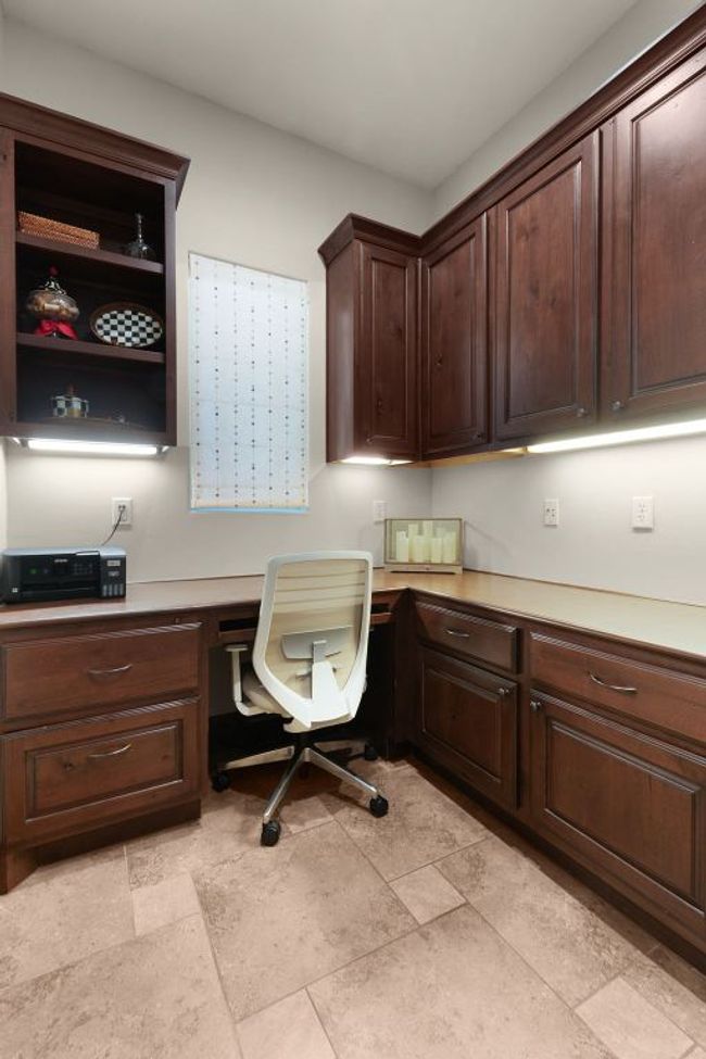 Office nook area featuring built in desk | Image 26