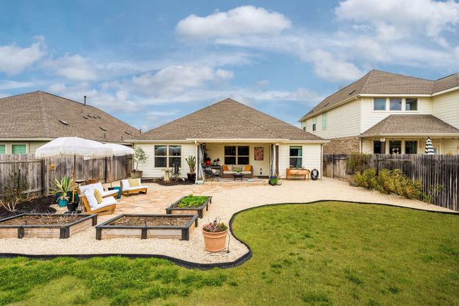 Vitex (Chaste) trees and flower beds plus a gravel lounge area | Image 21
