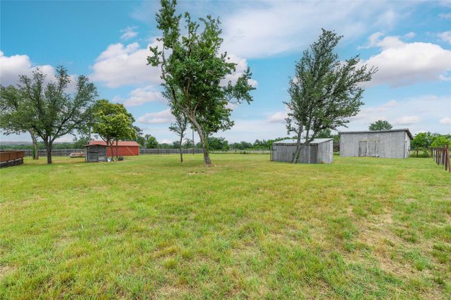 View of yard featuring an outbuilding | Image 29
