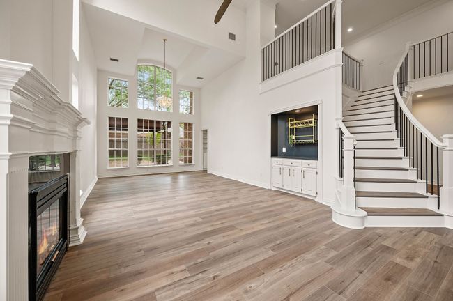 Living room with Cathedral ceilings, Dry Bar with Wine Rack, (Dry Bar is plumbed with water if new owner someday wants to add a sink) | Image 8