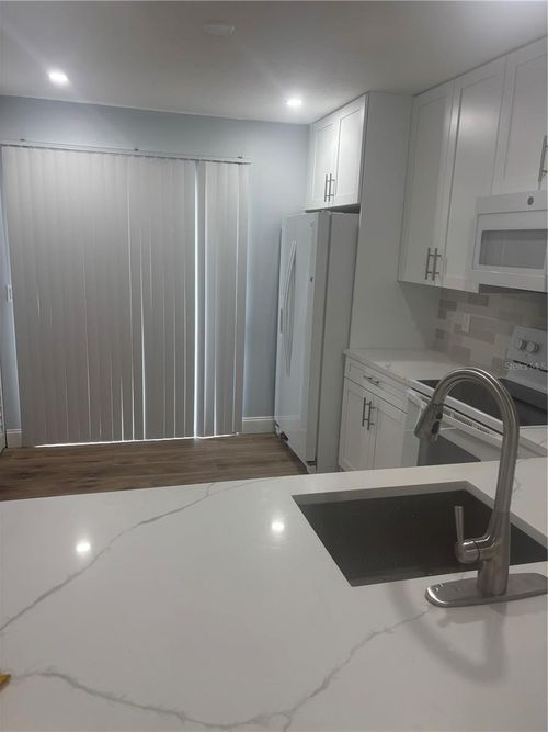 73 Macadamia Ct, Royal Palm Beach, FL, 33411-1651 | Card Image