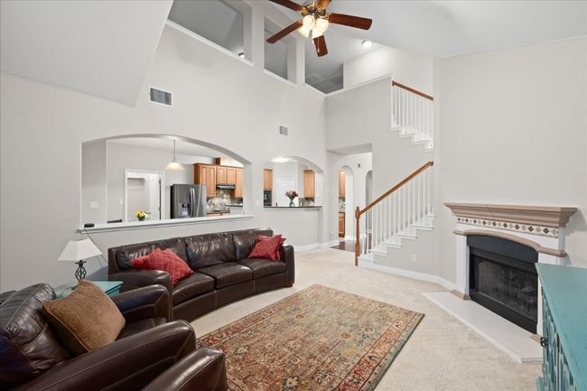 Upstairs loft overlooks the den. | Image 17