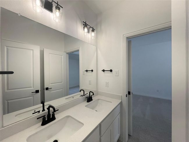 Bathroom featuring double vanity | Image 25