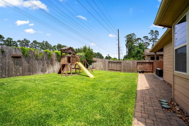 Here’s another view of the spacious backyard, where the privacy of no rear neighbors lets you enjoy peaceful, uninterrupted outdoor moments every day. | Image 35