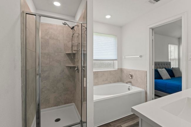 ...garden tub and separate shower with ceramic tile surround... | Image 20