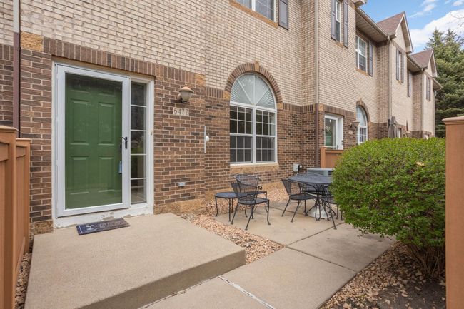 Enjoy relaxing on the front patio | Image 36