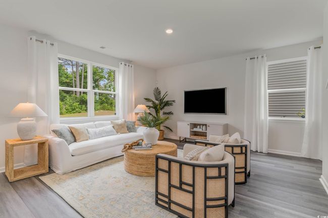 Living room featuring wood finished floors, baseboards, and recessed lighting | Image 12