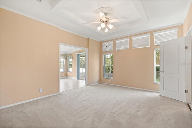 Main Suite looking into Florida Room then Screened Porch | Image 11