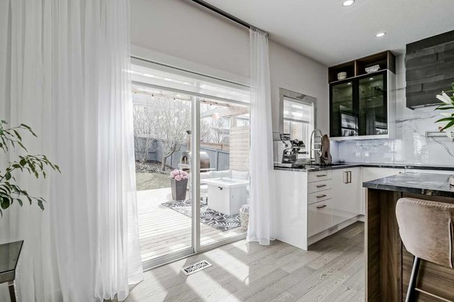 122 Rockywood Cir Nw, House other with 4 bedrooms, 4 bathrooms and 4 parking in Calgary AB | Image 11