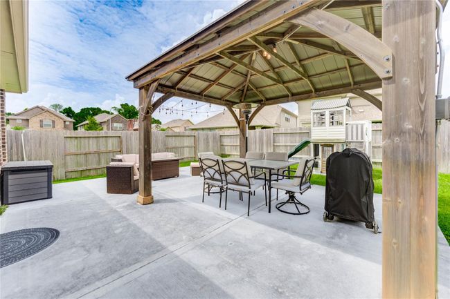 Added covered patio for comfort and entertaining! | Image 31