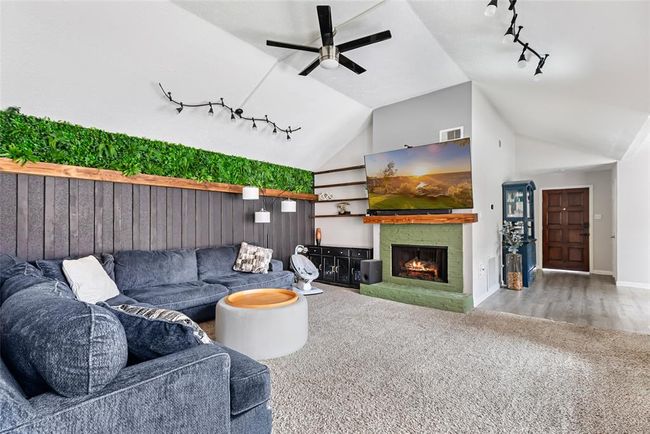 The fireplace has a gas starter !Living room gets plenty of natural light with door that goes out to patio! | Image 6