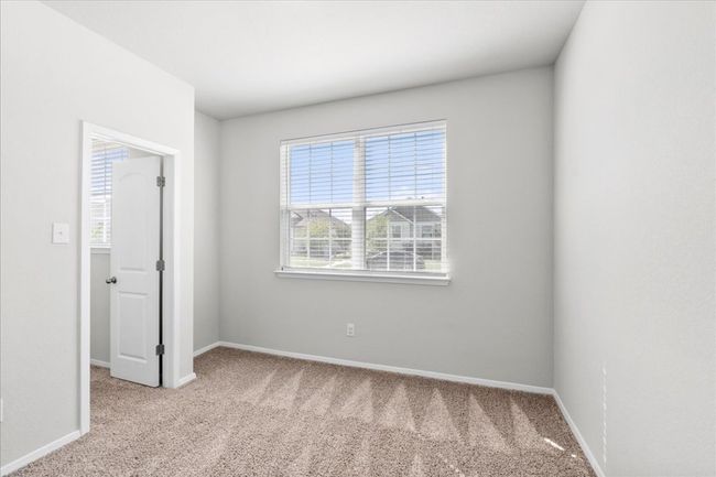 Carpeted spare room featuring baseboards | Image 20