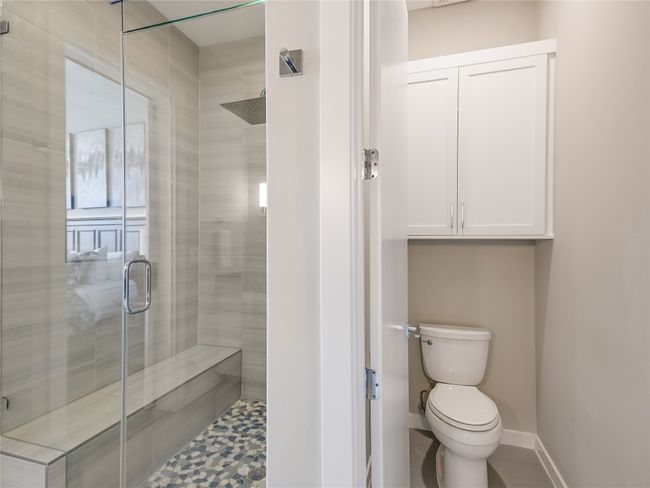 More storage available with a custom installed cabinet in the private water closet. | Image 16