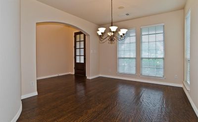 Entryway Features A High Ceiling, Plenty Of Natural Light And Hand Scraped Hardwood Floors. | Image 3