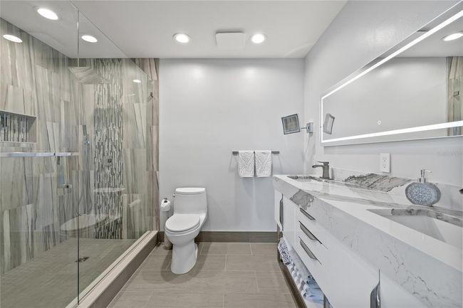 Master Bathroom with dual sink vanity with quartz countertop and oversized shower | Image 44
