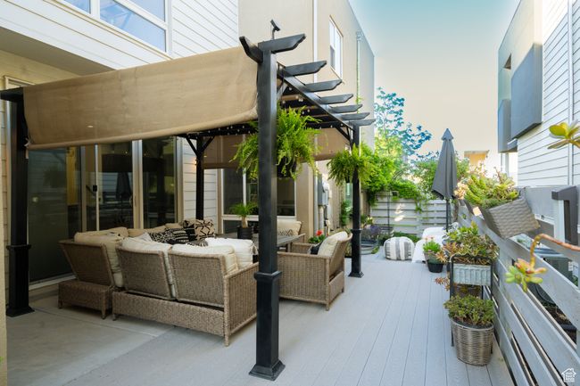 View of patio / terrace featuring outdoor lounge area and a pergola | Image 13