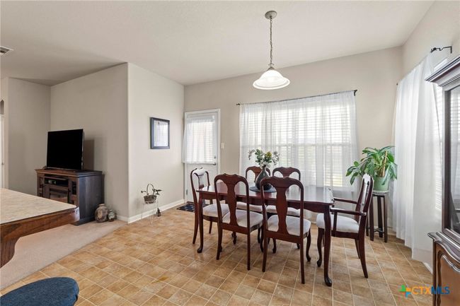 dining room open to living | Image 14