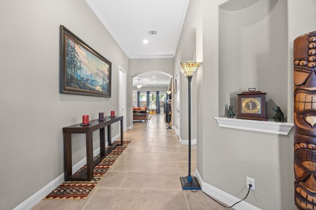 The wide foyer gives you a clear view into the heart of the home, setting the stage for the open layout and easy flow | Image 7