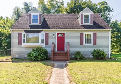 Cape cod house with a front yard | Image 2