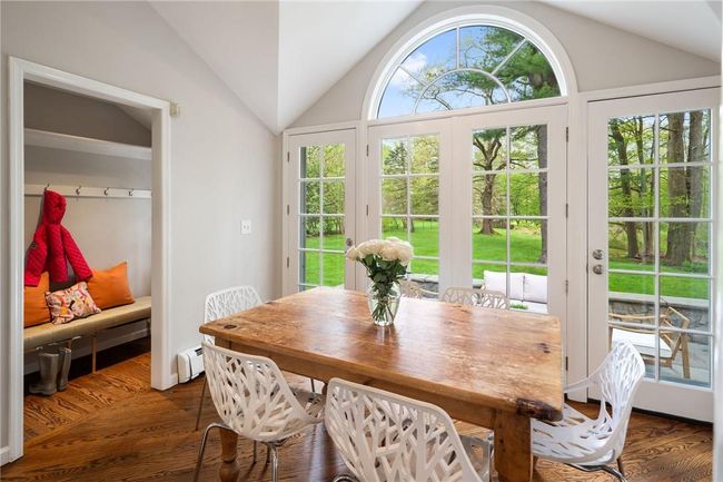 Access from mudroom. Exterior access to stone patio and backyard | Image 12