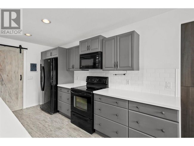1503 Tanemura Cres, House other with 6 bedrooms, 4 bathrooms and 4 parking in Kelowna BC | Image 8