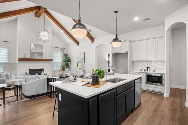 Tasteful backsplash and quartz countertops | Image 17