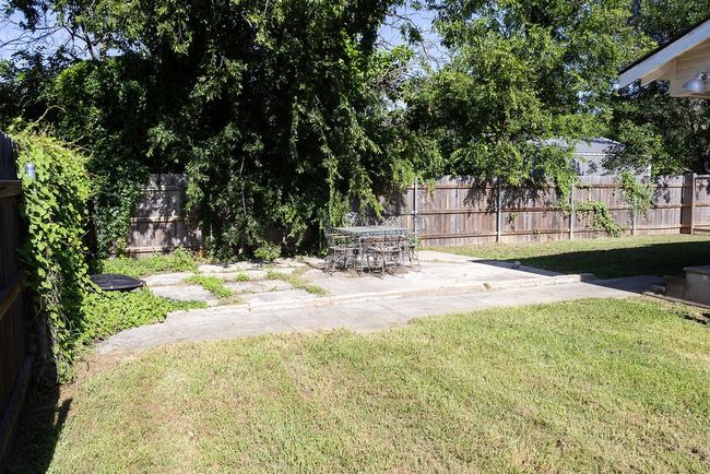 Fenced backyard featuring a patio | Image 27