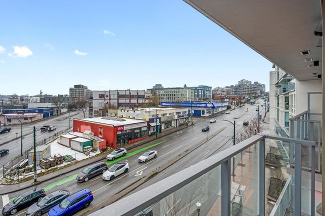 Balcony featuring a view of city | Image 21