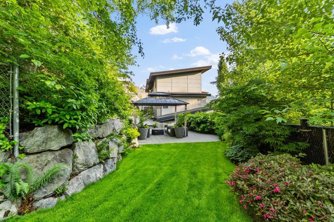 Back of property featuring a gazebo, a lawn, and an outdoor hangout area | Image 31