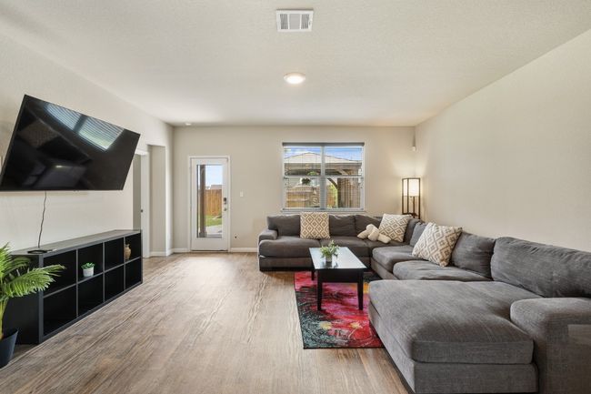 Great room living space fits large furniture. | Image 20