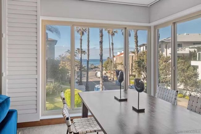 Dining table seats 6 people with beautiful ocean view. This dining area is optional and the area could become part of an enlarged living room. | Image 8