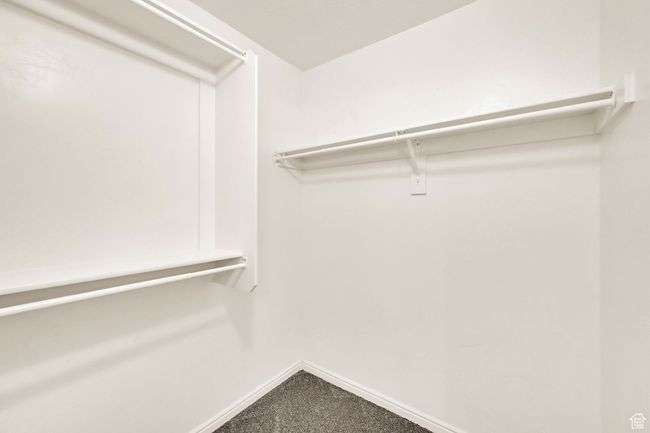 Spacious closet with carpet floors | Image 23