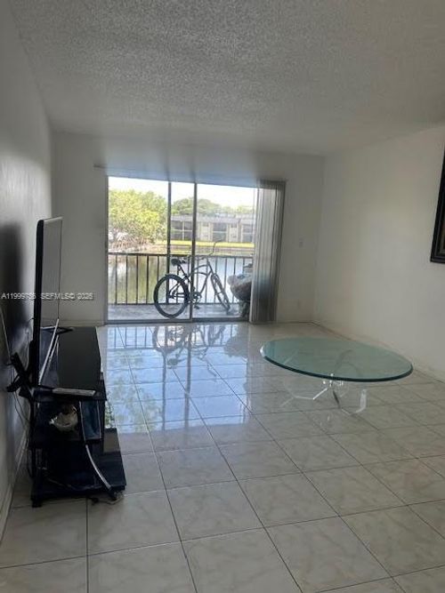 n-204-7910 Colony Cir N, Tamarac, FL, 33321-8307 | Card Image