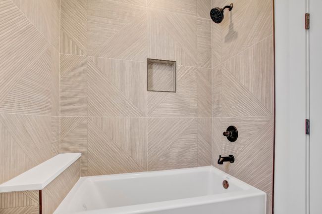 Bathroom featuring shower / tub combination | Image 29