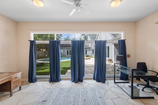 Office off of primary bedroom overlooking pool area | Image 20
