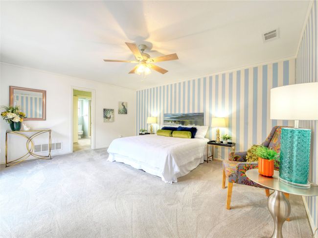 Carpeted bedroom with crown molding and a ceiling fan | Image 16