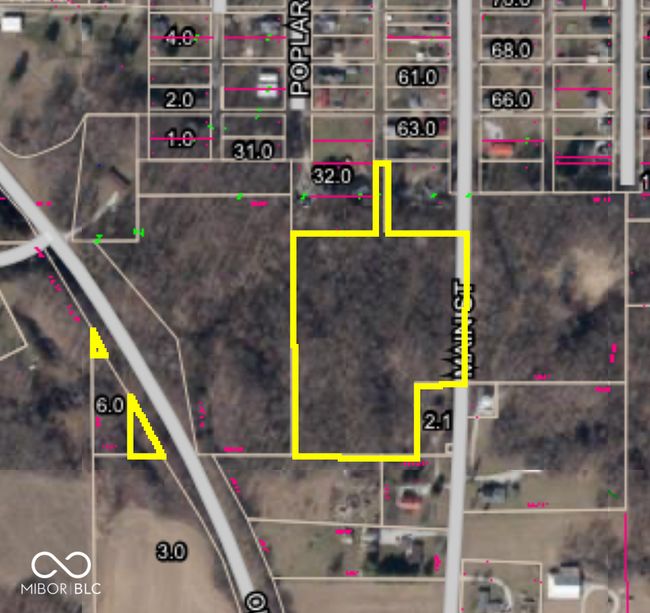 The 2 little triangle spots are actually art of the parcel. This was verified at the courthouse when purchased. | Image 9