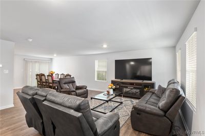 Living room featuring light hardwood / wood-style flooring | Image 3