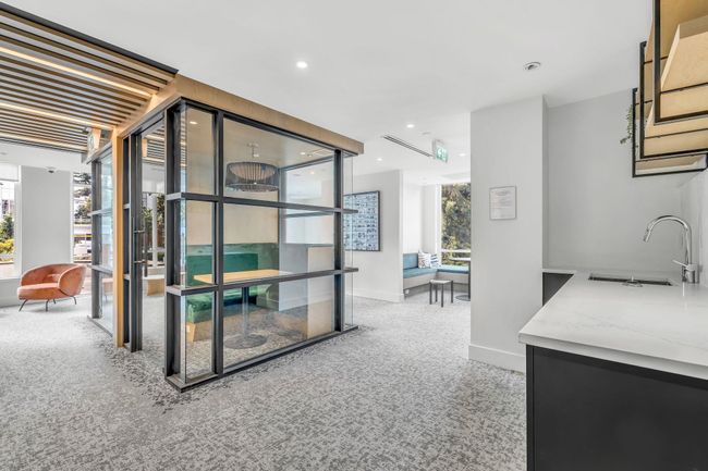 Corridor with carpet flooring and recessed lighting | Image 23