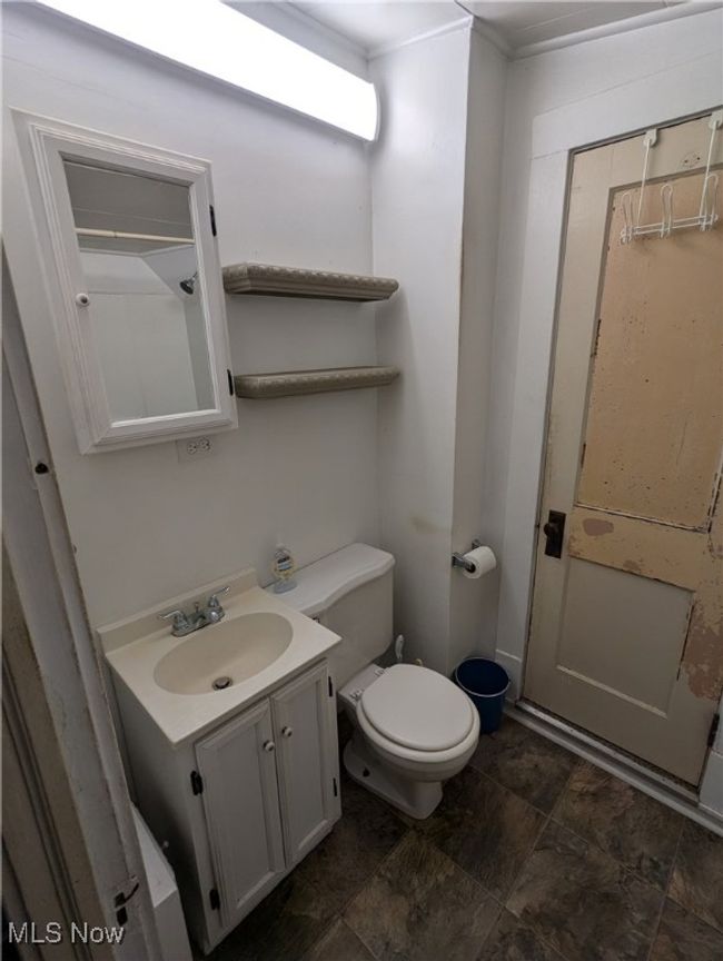 Second-Floor Bathroom featuring toilet and vanity | Image 29