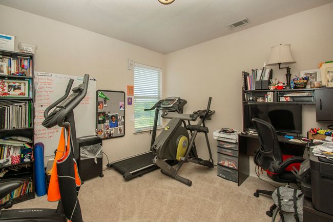 Workout area featuring carpet floors | Image 16