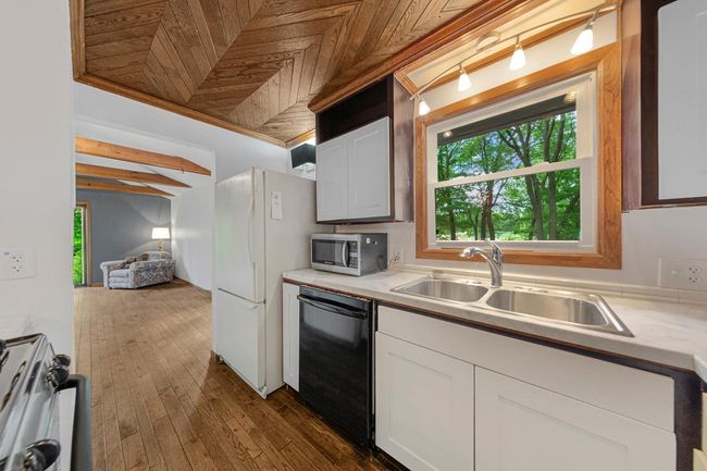 Kitchen with hardwood floors, and a hardwood ceiling!! | Image 17