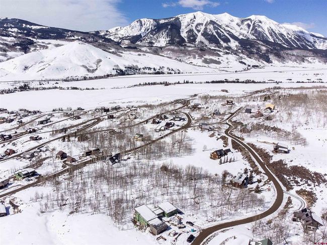 Snowy aerial view with a mountain view | Image 4