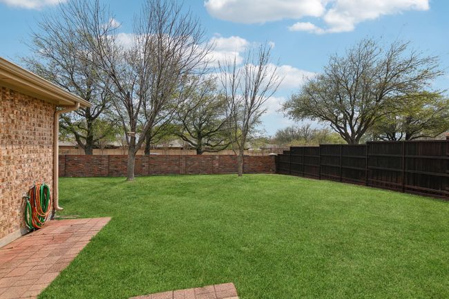 View of yard with a fenced backyard | Image 32