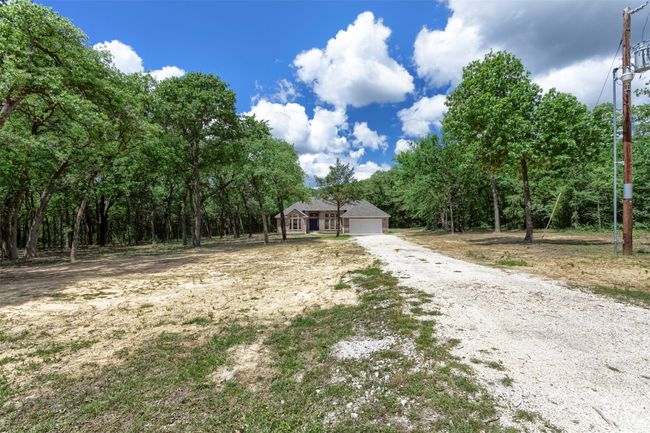 View of front of house featuring driveway and an attached garage | Image 29