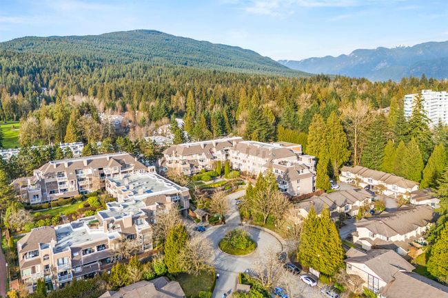 Aerial view with a residential view, a mountain view, and a wooded view | Image 29