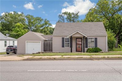 Bungalow featuring a garage | Image 3