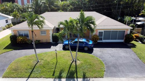 310 Wilma Cir, Riviera Beach, FL, 33404-4618 | Card Image