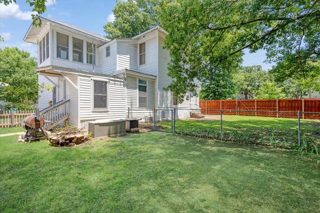 small area of side yard is fenced in for your kids or your pets | Image 30
